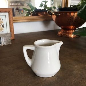 Cute little white pitcher